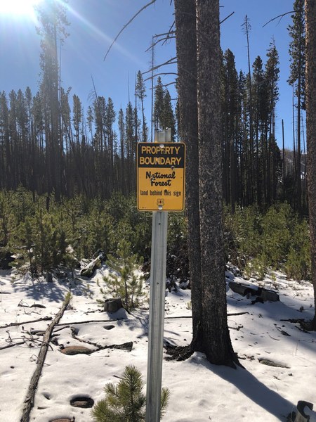 Rendezvous- borders National Forest sign up close.jpg